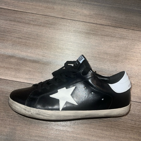 Golden Goose Other - Golden Goose. Black size 42 in leather. Slightly damaged in the back with photo